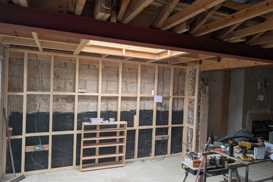 Dining room during first fix electrical work with new wiring for sockets and recessed spotlights, Chorley kitchen rewire project.